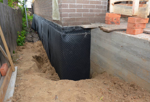 SJ Waterproofing Pros technician performing targeted Waterproofing assessment in Manahawkin, NJ